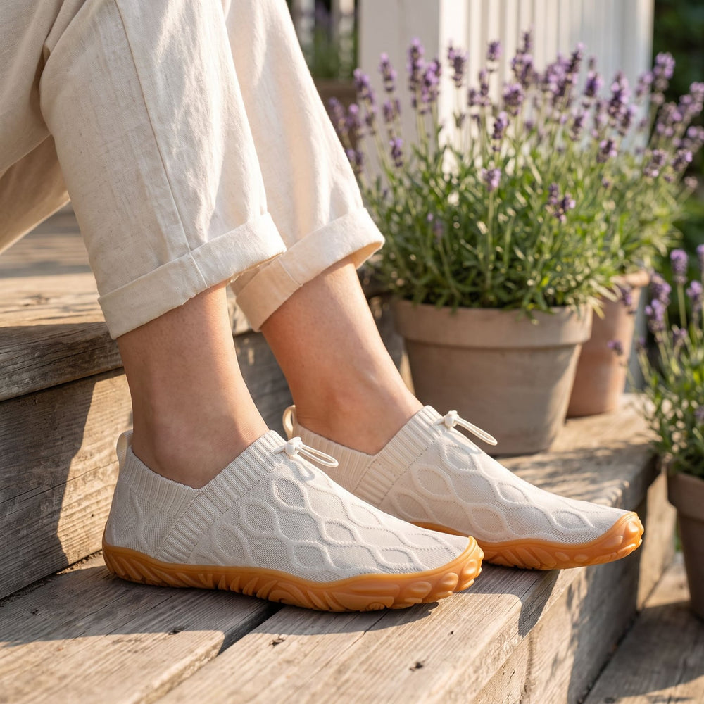 StrideFlex Wide in off-white on a porch step